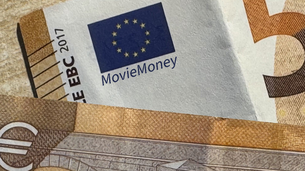 Sie sehen einen Teil eines Geldscheines, der mit dem Schriftzug &bdquo;MovieMoney&ldquo; markiert wurde.