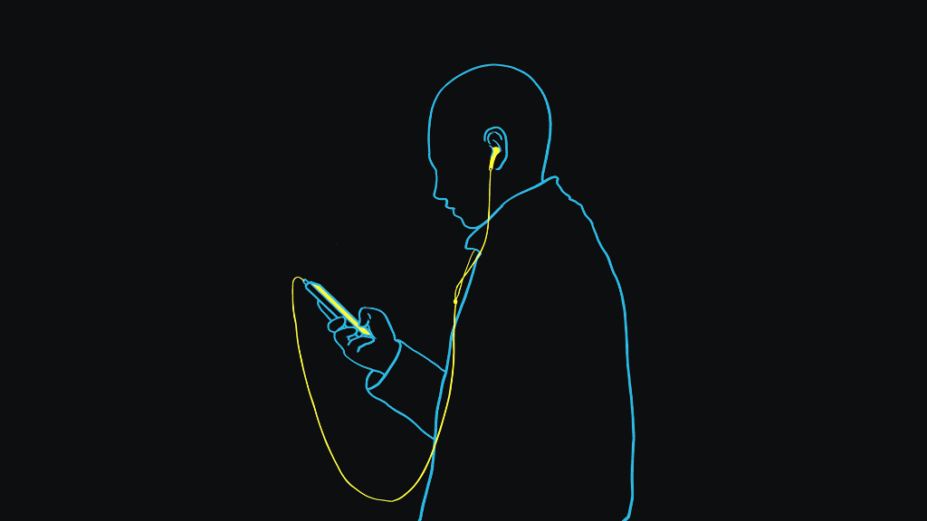 Sie sehen eine Person mit Kopfhörern beim Musik hören.